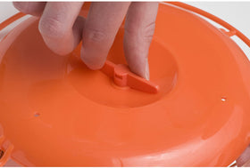 Built in stirrer on Perky-Pet Oriole feeder base distributes jelly evenly
