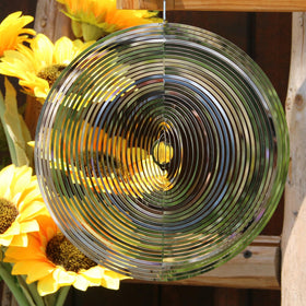 Phuryllic wind spinner round front view with reflective shimmer for outdoor decor.