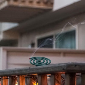 PIC Mosquito Repelling Coils used on a patio setup to reduce interruptions.