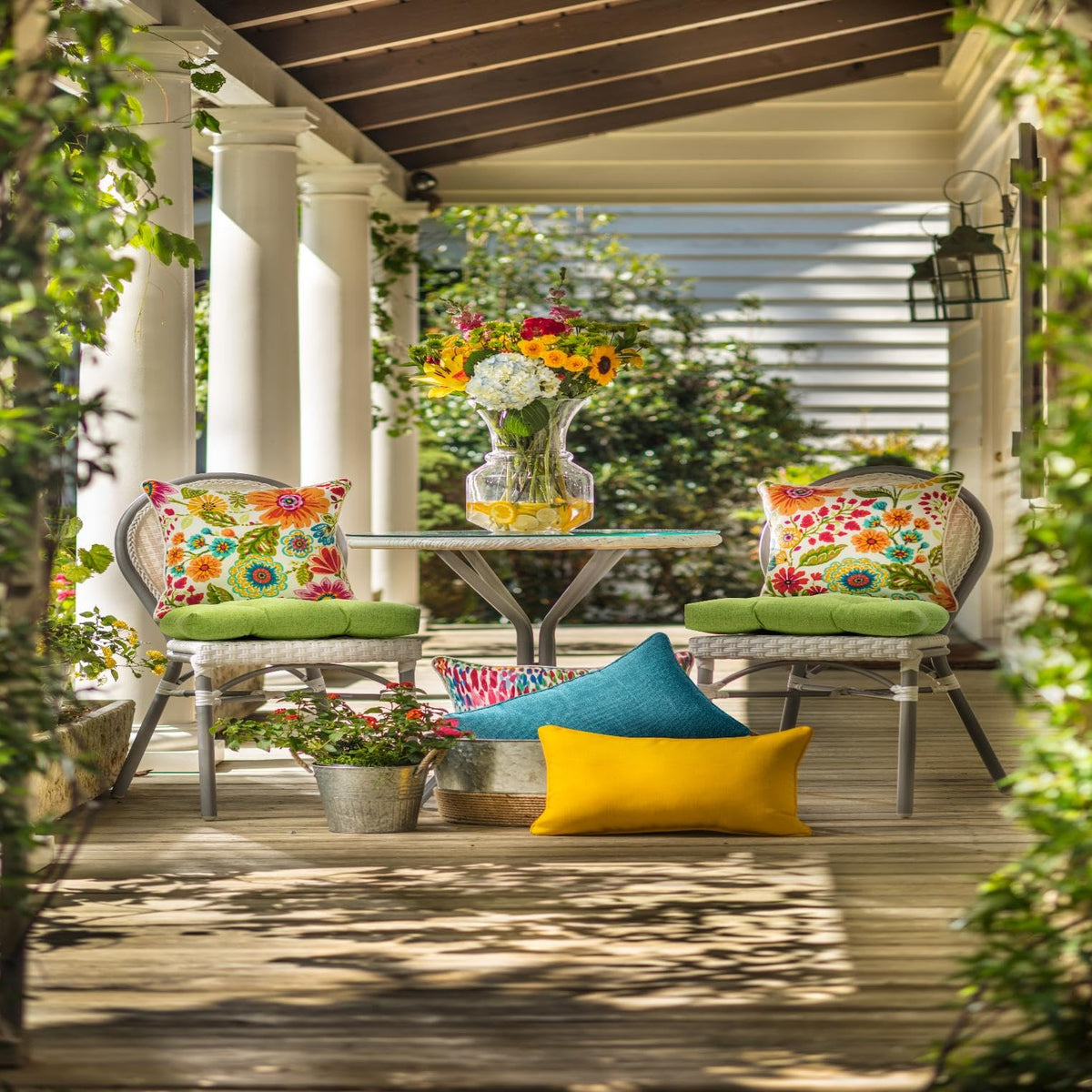 Pillow Perfect tufted chair pad, reversible for outdoor and indoor styling