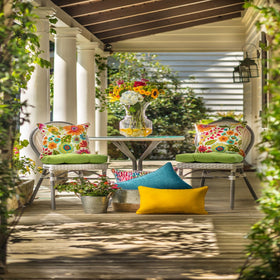 Pillow Perfect tufted chair pad, reversible for outdoor and indoor styling