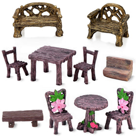 Pivnasy fairy table and chairs miniature set enhances whimsical garden decor.