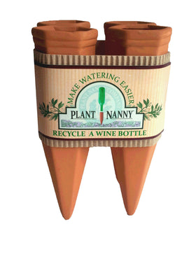 Plant Nanny wine bottle stake set delivering steady moisture for thriving indoor plants
