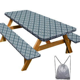 Play Tailor picnic table cover in blue-green plaid protecting a table outdoors.