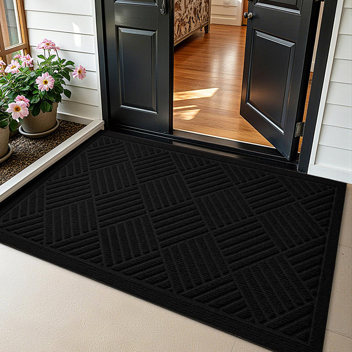 PLEASOR front door mat at outdoor entrance absorbing moisture and dirt for cleaner entry.