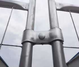 Galvanized steel fence clamp from Plutreas with included hardware highlighted.