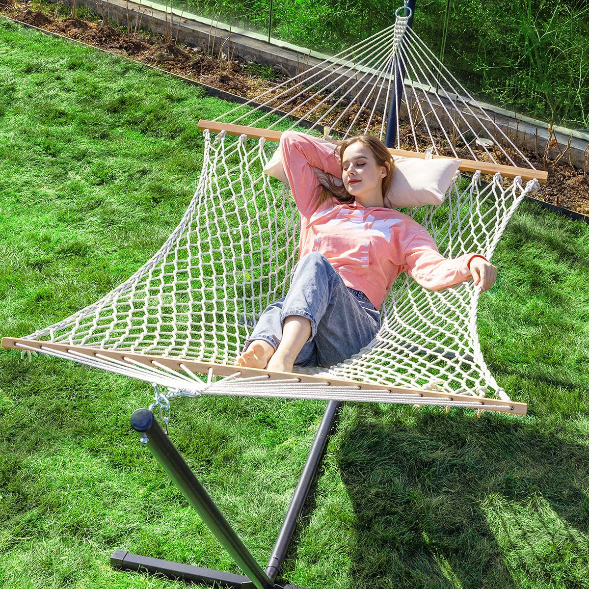 PNAEUT double rope hammock with stand offers a cozy outdoor view for two.