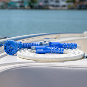 Pocket Hose deployed on deck highlights the scuff-free white surface.