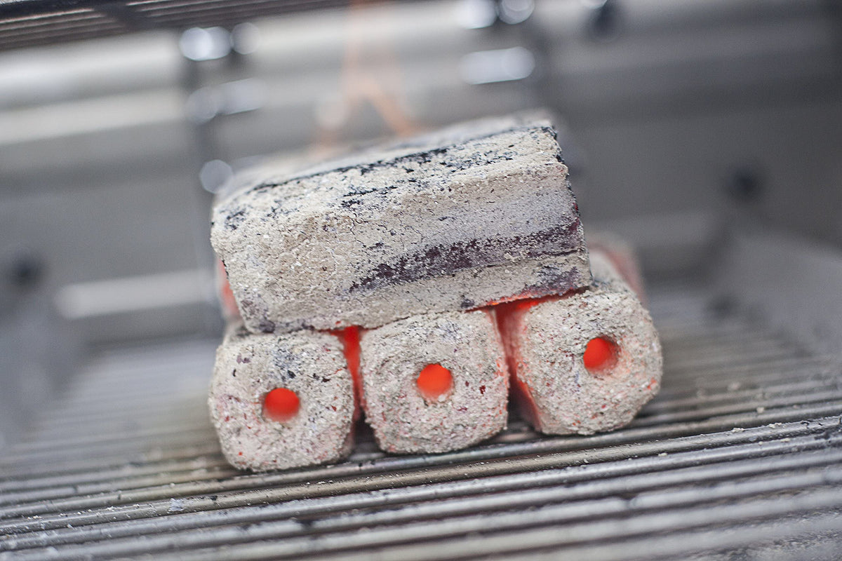 Pok-Pok Thaan Charcoal indirect-cooking emphasizes controlled heat for delicate items.