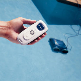 Polaris 9550 Sport remote-control demonstrates hands-on navigation for precise cleaning sessions.