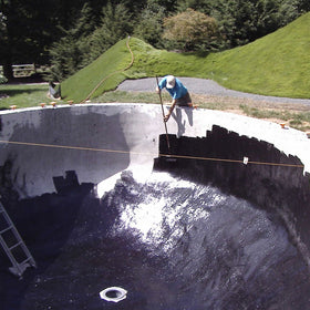 Pond Armor non-toxic epoxy coating applied to pond surface for safe wildlife use