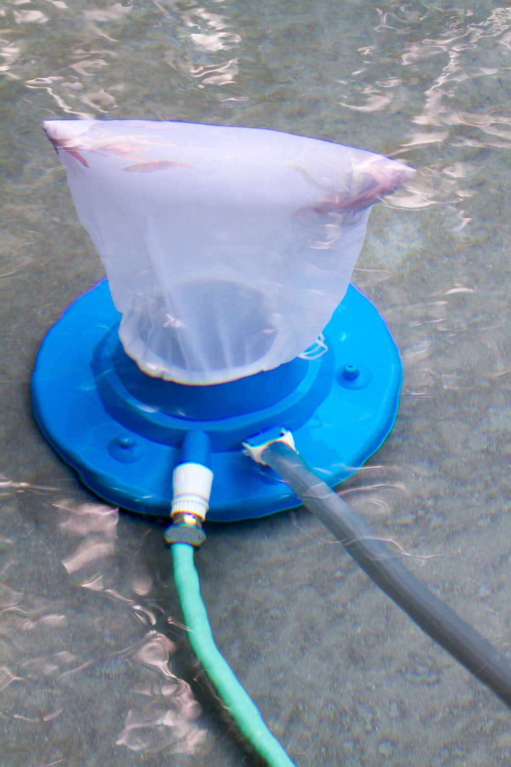 Poolmaster Big Sucker underside with eight jet nozzles delivering strong suction.