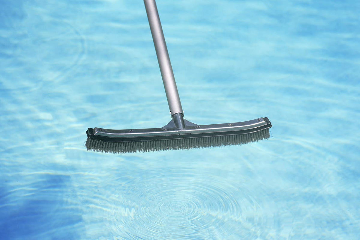Poolmaster 18-inch brush covering wide area for efficient cleaning on stairs.