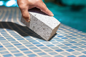 Poolmaster Extra Large Pro Pumice Stone broken into pieces for tight spots.