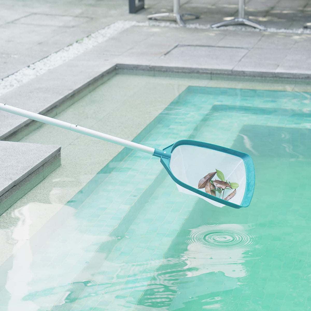 POOLWHALE compact storage skimmer for easy garage or shed use.