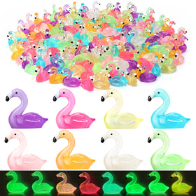 PoseablePals luminous flamingos in 8 colors brighten fairy garden scenes at dusk.