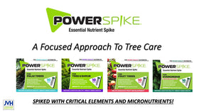 Power Spike closeup-spike-in-soil placed near palm trunk