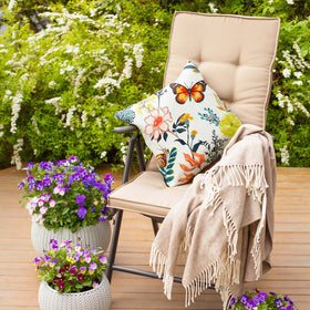 Premillow weather-resistant cover shields cushions from sun and moisture.