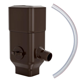 Prestantious downspout diverter on left-side spout directing rain to a barrel for efficient collection.