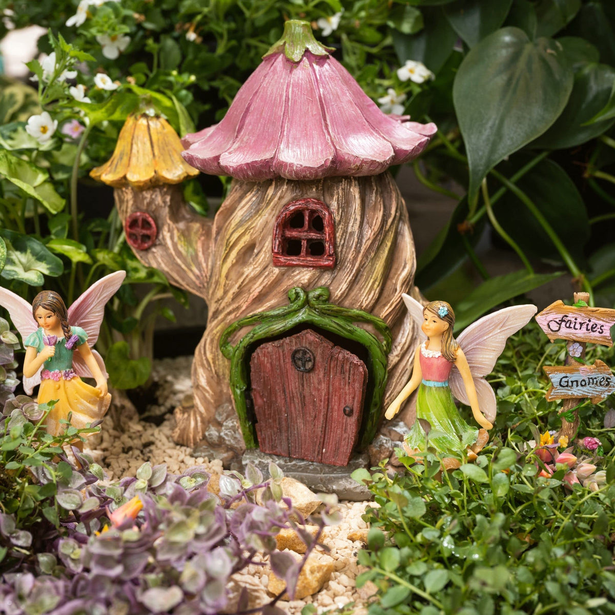 PRETMANNS Fairy House with patio view creates a charming focal point.