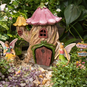 PRETMANNS Fairy House with patio view creates a charming focal point.