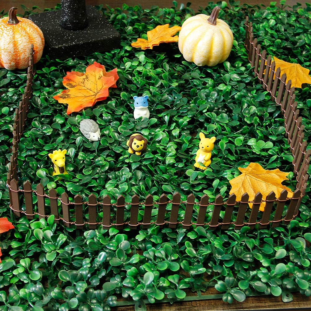 Prsildan brown fairy garden fence closeup shows painted wood texture.