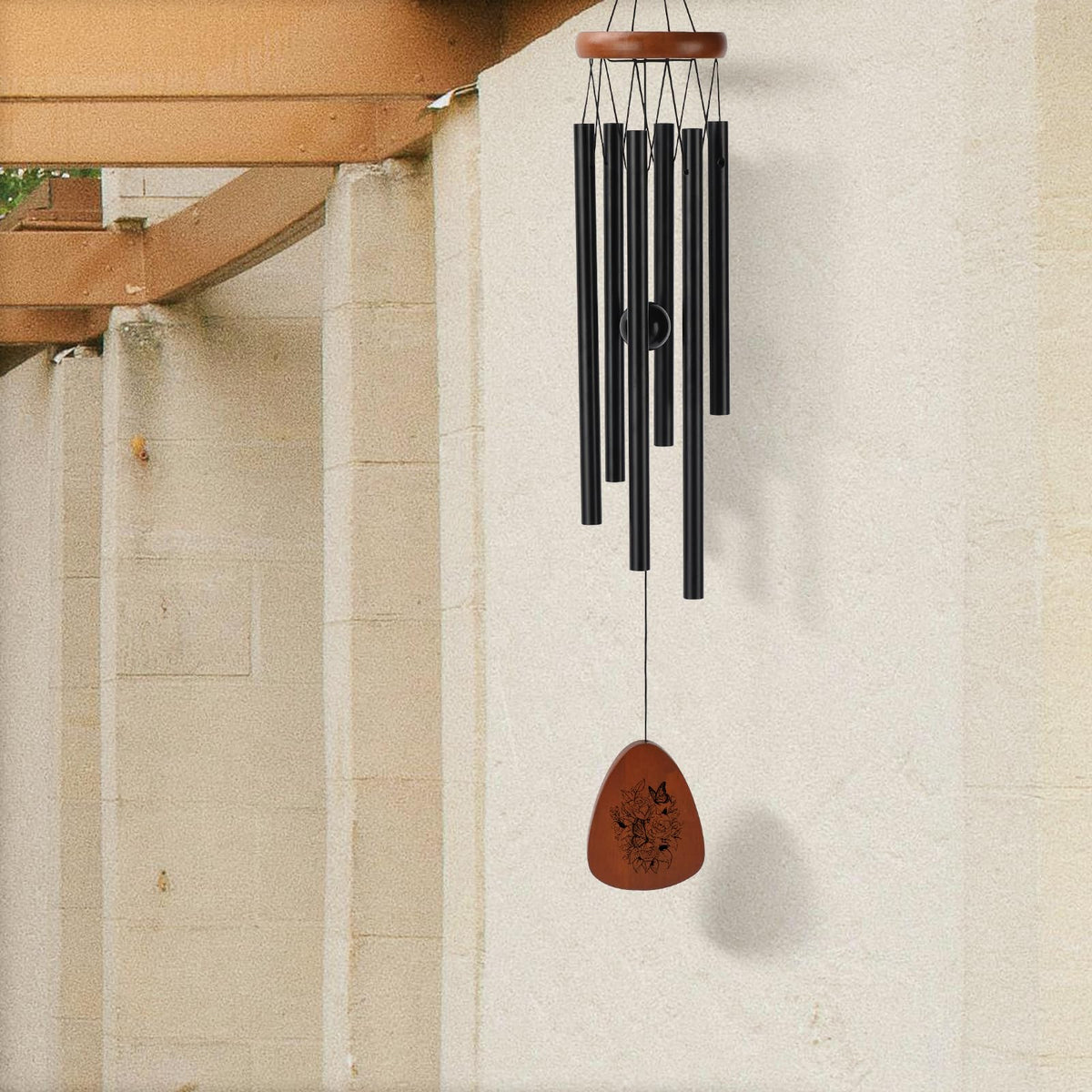 PRSTENLY wind chimes on a porch create relaxing sounds during evenings.