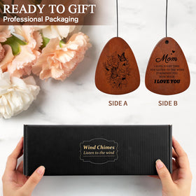 PRSTENLY wind chimes gracing an entryway invite a gentle breeze and nostalgic tones.