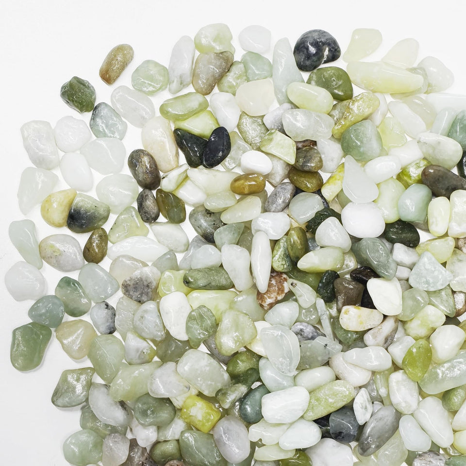 Pulovin jade pebbles for succulents add shine and vibrant contrast.