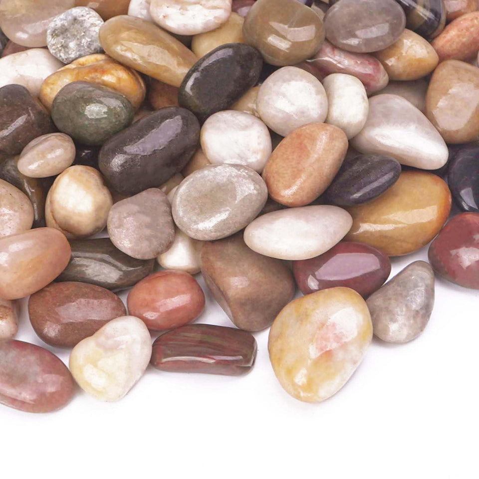 Pulovin polished river rocks add a dazzling shine to garden paths.