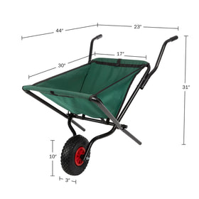 Pure Garden folding wheelbarrow with 10-inch pneumatic tire on uneven ground.