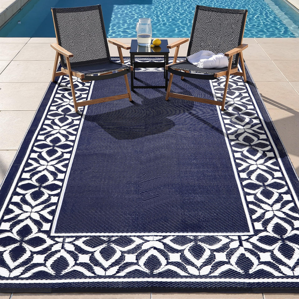 PureCozy outdoor rug navy blue 5x8, waterproof and durable for patios.