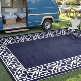 PureCozy navy rug, quick-dry, easy-clean surface for beach or porch.