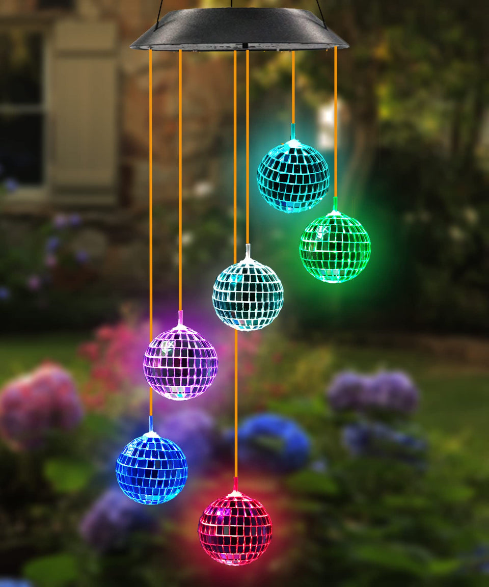 Purtuemy Solar Wind Chime garden color-changing lights illuminate outdoor spaces at night.