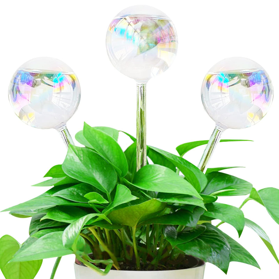 Pynqdfu colorful glass watering globe indoors keeps plants hydrated while you're away