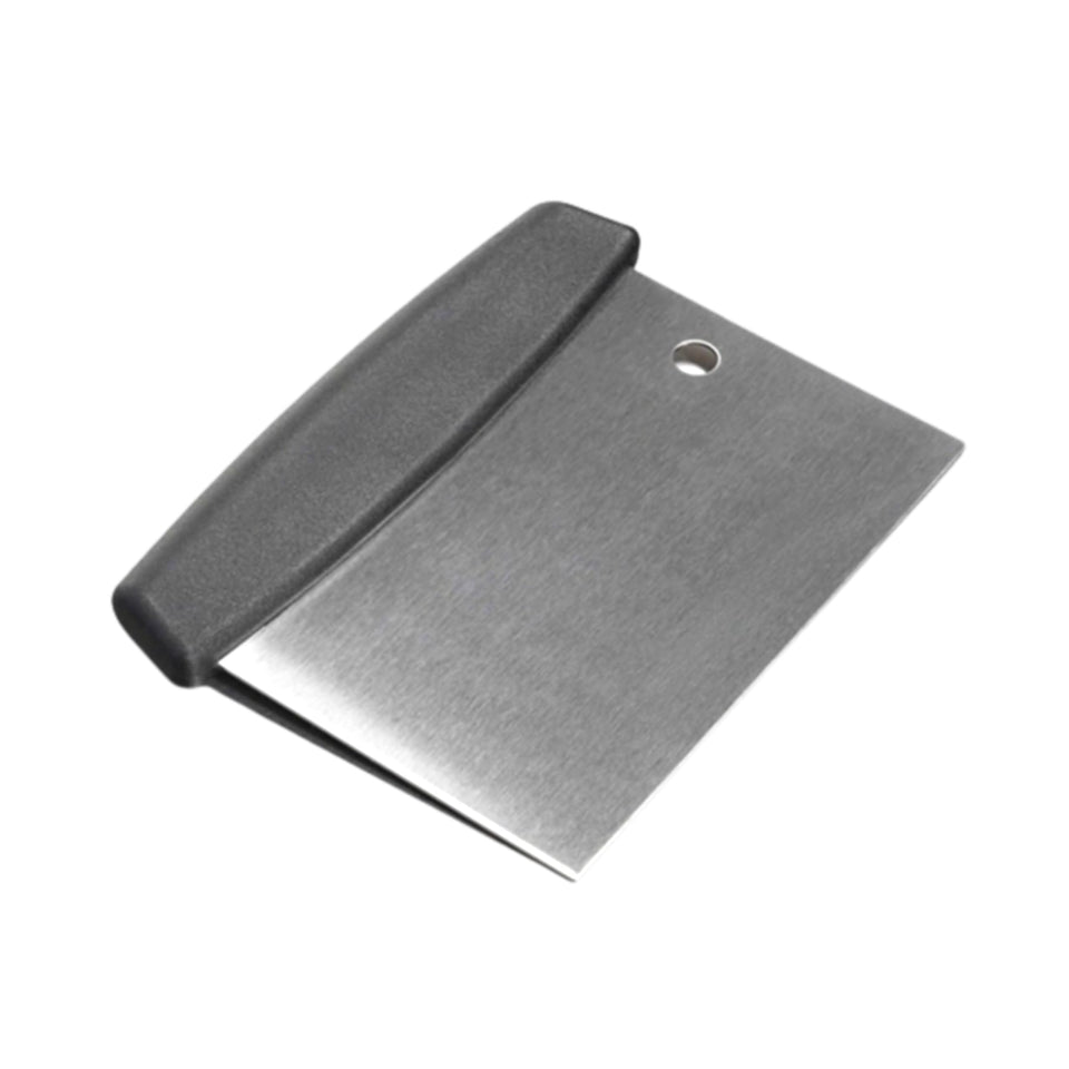 Qfire replacement griddle scraper close-up on Blackstone, built to power through burnt-on residue