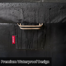 QH.HOME all-weather black fire pit cover shielding a 26-28 inch pit outdoors.