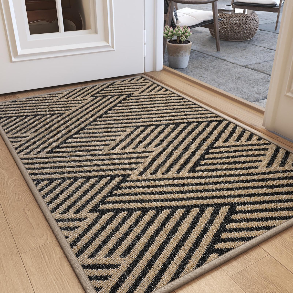 QiCaiJia door mat with textured fabric edges enhances entryway aesthetics and durability.