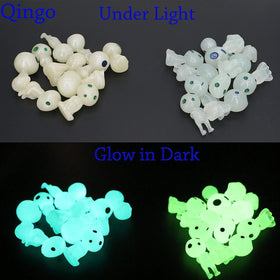 Qingo luminous ghost figures add whimsy to micro landscape arrangements.