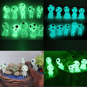 Luminous ghost elves illuminate tiny garden scenes after dusk.
