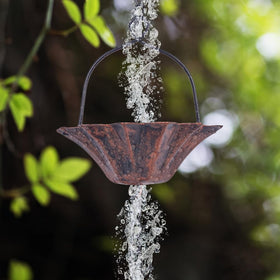 Sturdy metal rain chain with protective coating resists rust and fading.