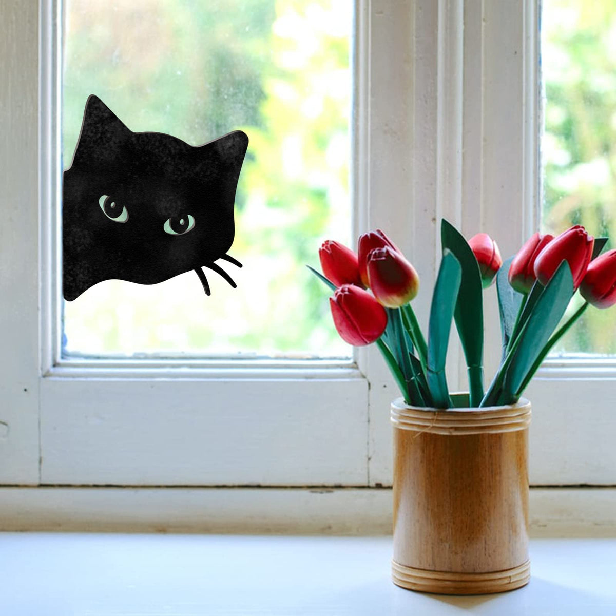 Qmetalart metal cat-face decor for porch or fence adds modern silhouette.