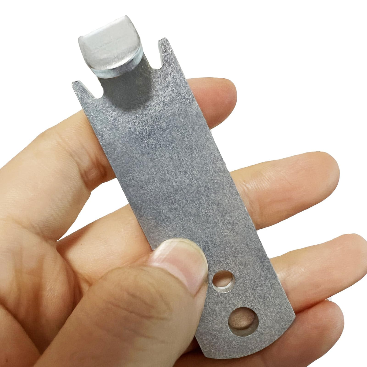 Quantfire tool fixing T-post clamps securely on fencing posts.