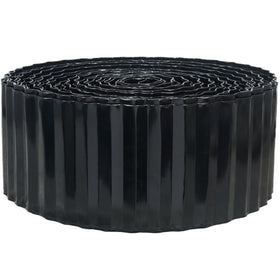 Quibbay corrugated metal edging along a lawn creates a clean black 4-inch border for a tidy lawn edge.