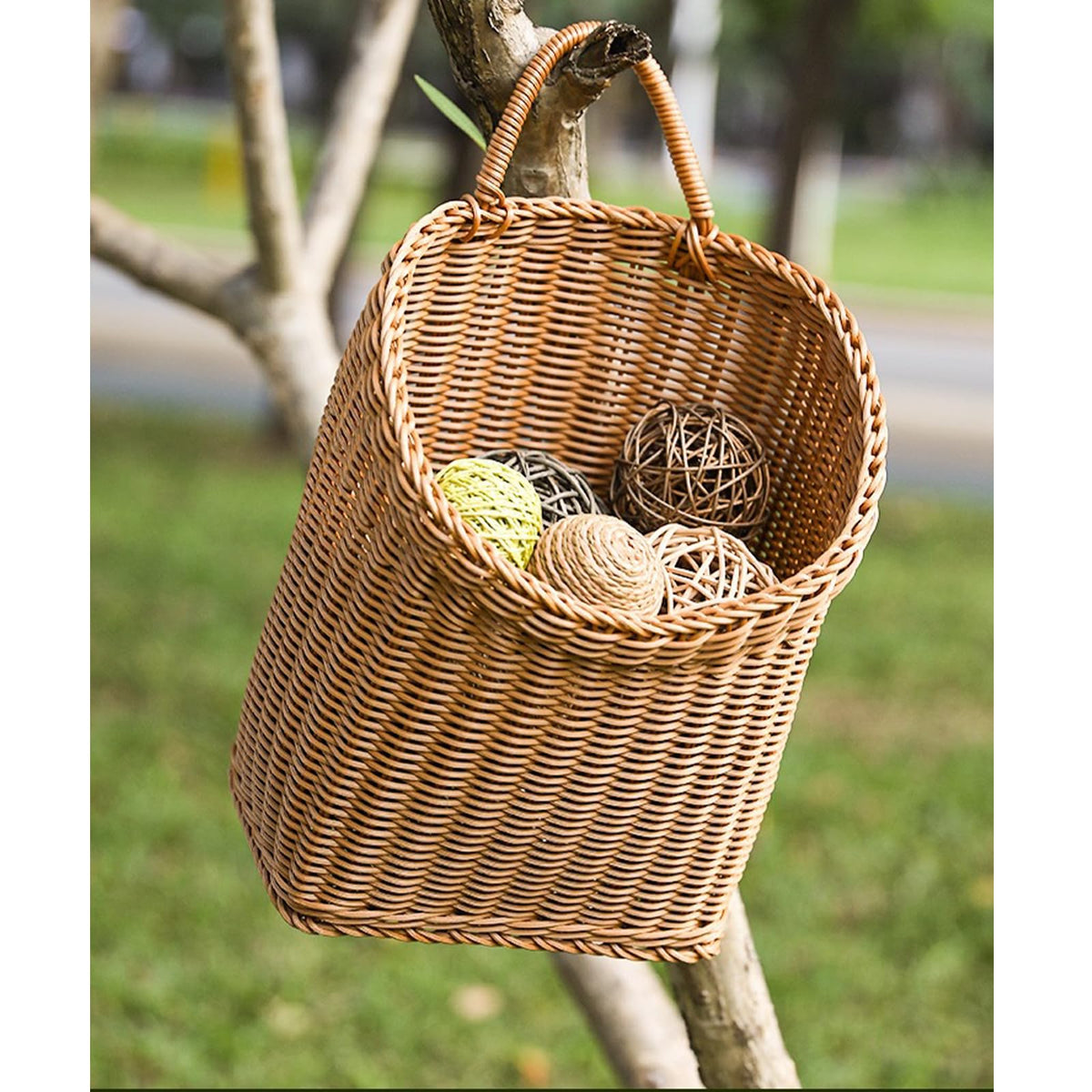 Quincry garden decor basket ideal for dried flowers or faux plants on a patio.
