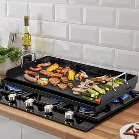 QuliMetal griddle in camping setup showcasing portable outdoor cooking versatility.