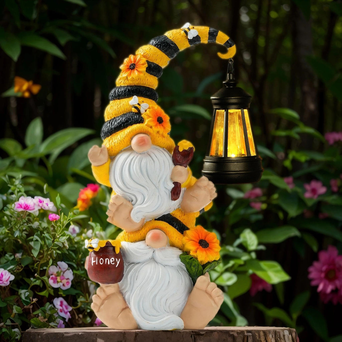 QZZP Solar Bee Garden Gnomes with LED Lantern light up dusk garden paths for a cozy outdoor ambiance.