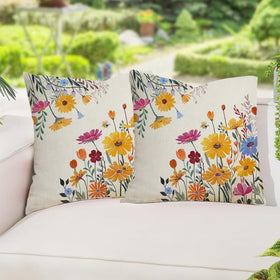 RABUSOFA outdoor pillow cover on patio setup with yellow blooms