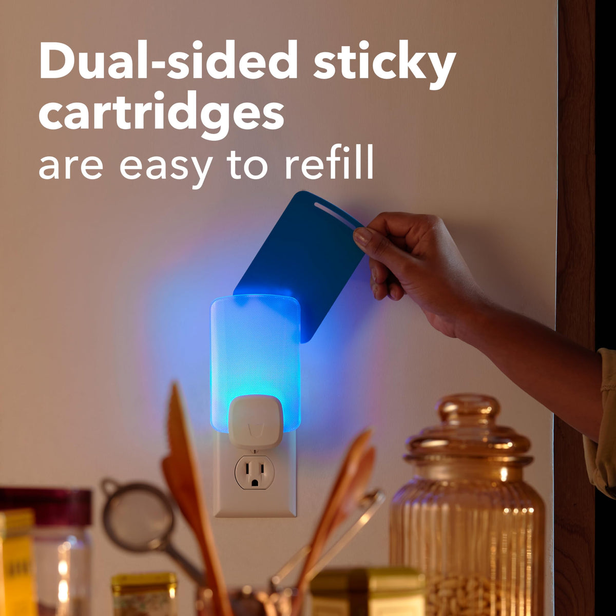 Raid Essentials light trap in living room setup for quiet pest control.