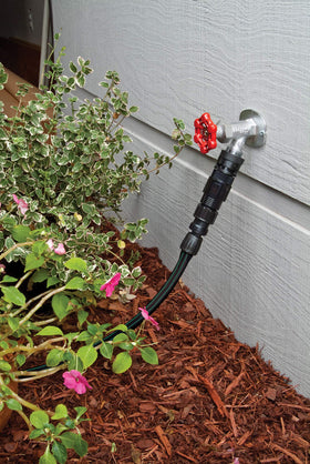 Rain Bird FCKIT-1PK mounted on faucet demonstrates easy, leak-proof connection.
